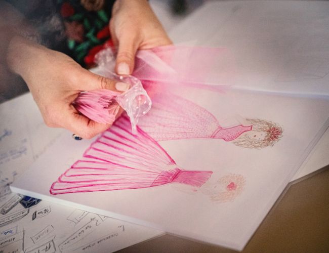 Organizzatore di matrimoni Maria Mayer donna che dipinge una scena di una festa di matrimonio primaverile